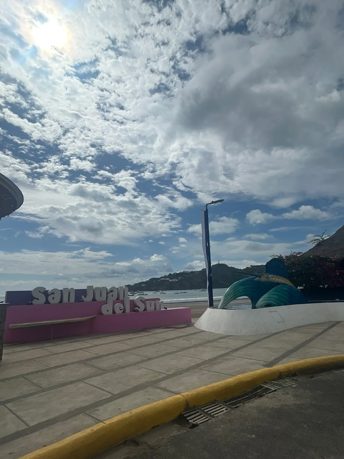 Sunset at the San Juan del Sur bay, Nicaragua The San Juan del Sur sign and marlin statue by the bay, Nicaragua